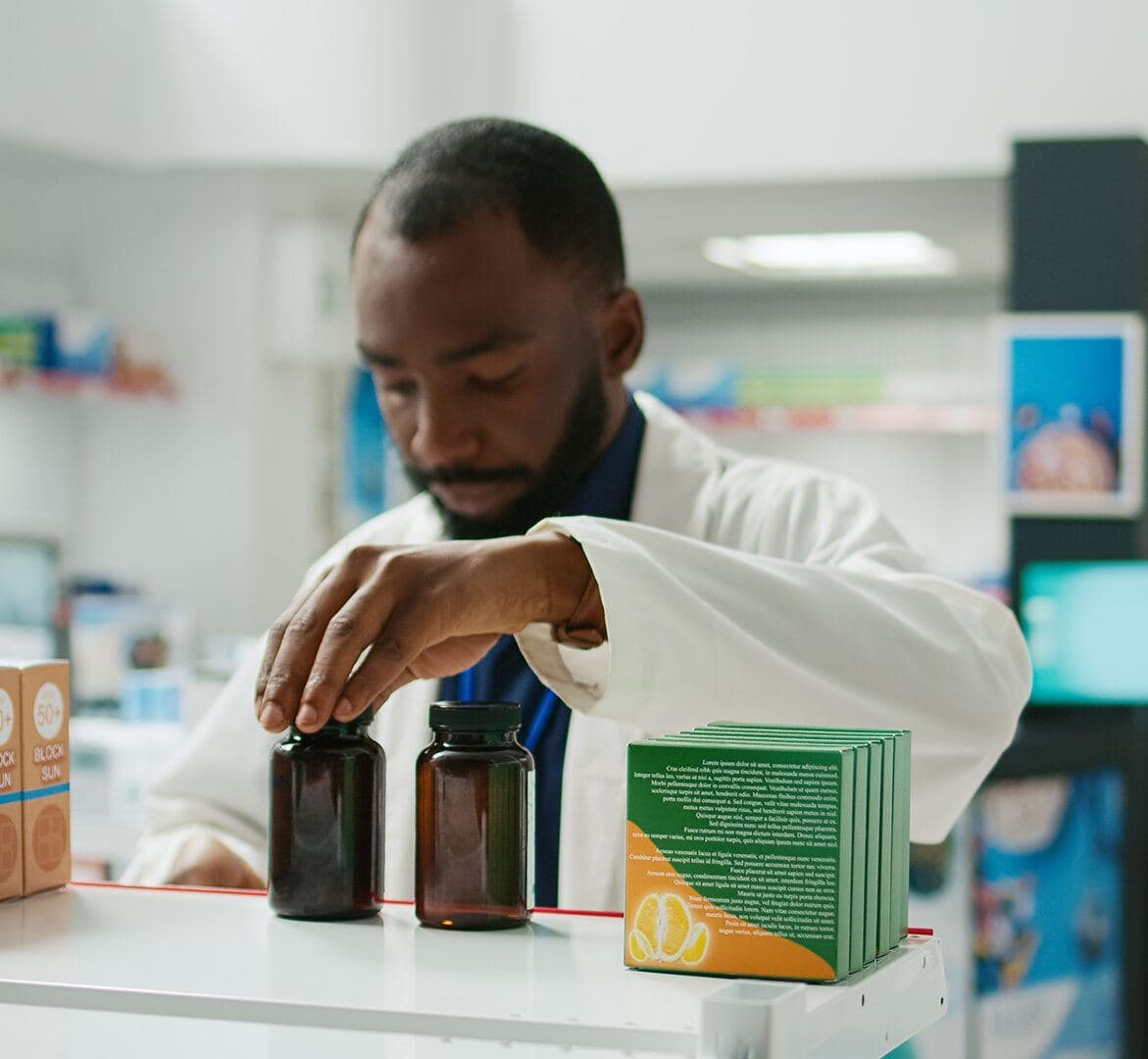 A pharmacist preparing a compounded prescription
